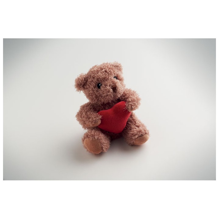 Petit ours peluche avec cœur